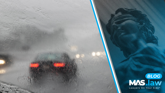 Car driving in the rain.